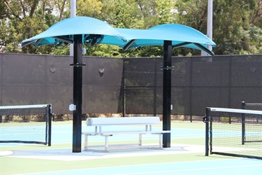 Covered benches with an umbrella