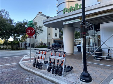 Scooters parked in scooter rack