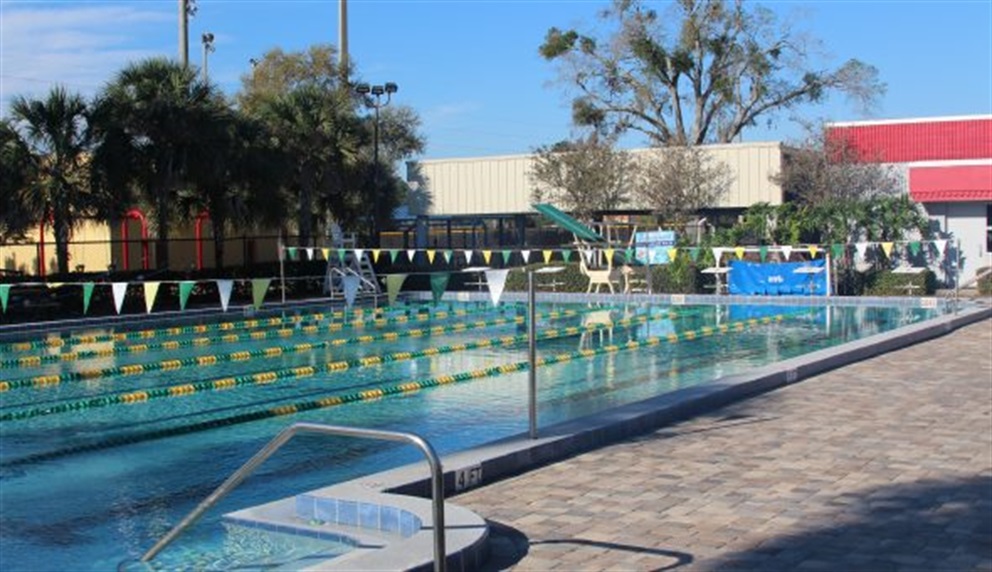 Dover shores pool, with lanes roped off for lap swimming.