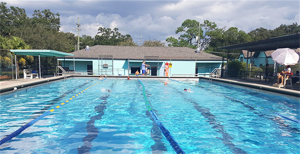 People swimming laps at John Long pool.