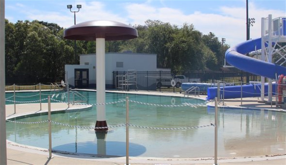 Smith pool with water slide and fountain.