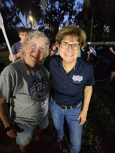 District 4 Commissioner Patty Sheehan posing with a city resident at an NNO Block Pary