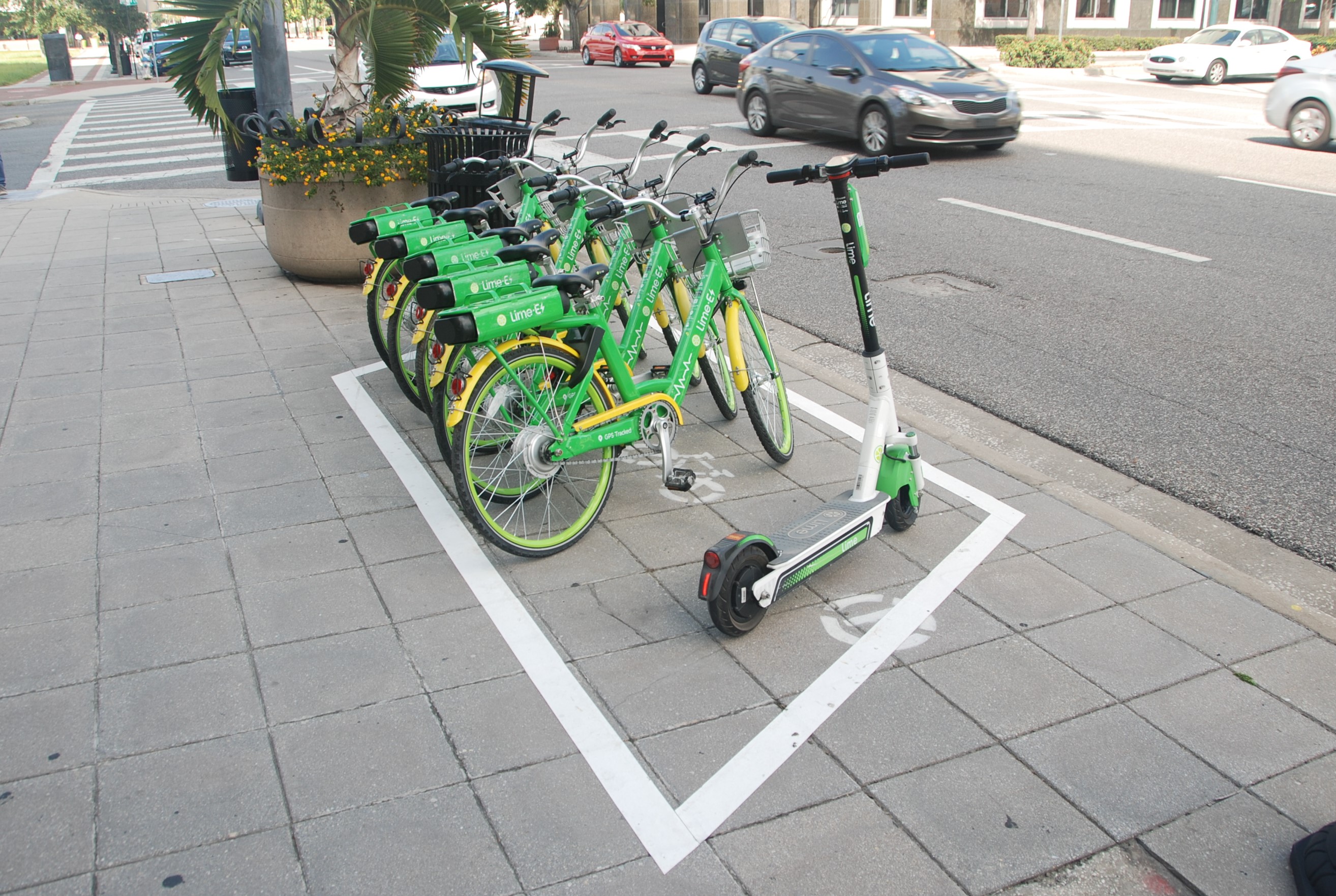 Good Example of E-Bikes and E-Scooters Parked in Designated Area