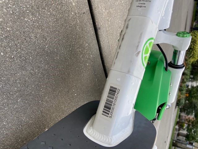 Closeup of the barcode located on the frame of a Lime bike