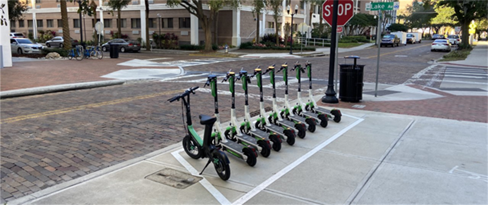 Scooters and a bike parked correctly.